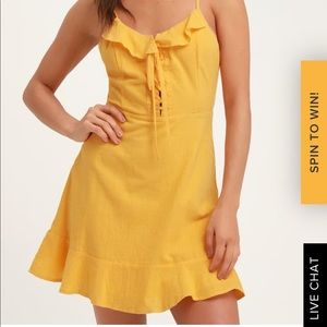 Lulu’s yellow lace up mini dress